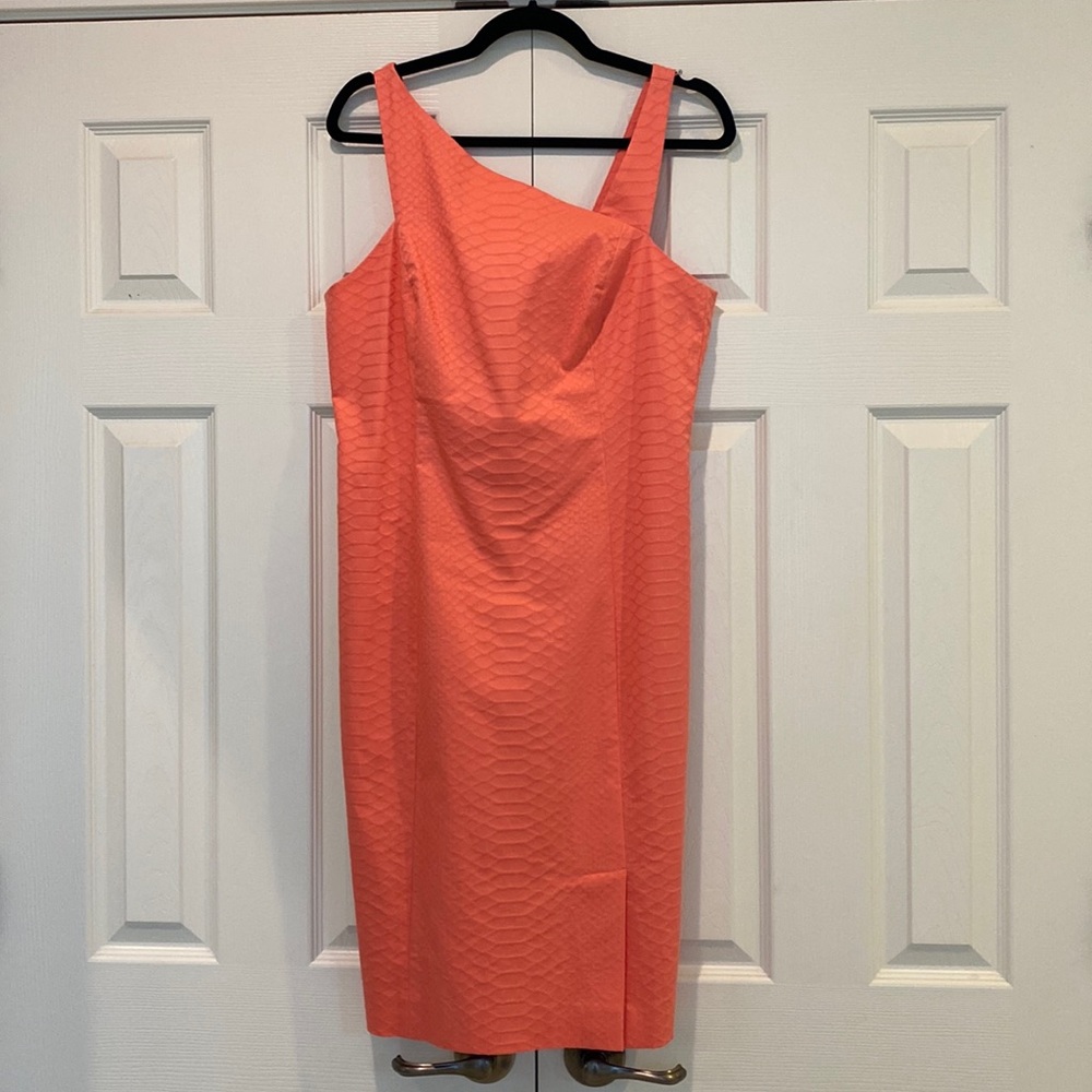 Beautiful coral color Doncaster dress , ideal for a wedding guest . Fully lined